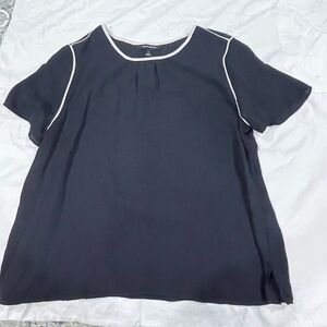 Dressy navy tee with white trim 100% polyester